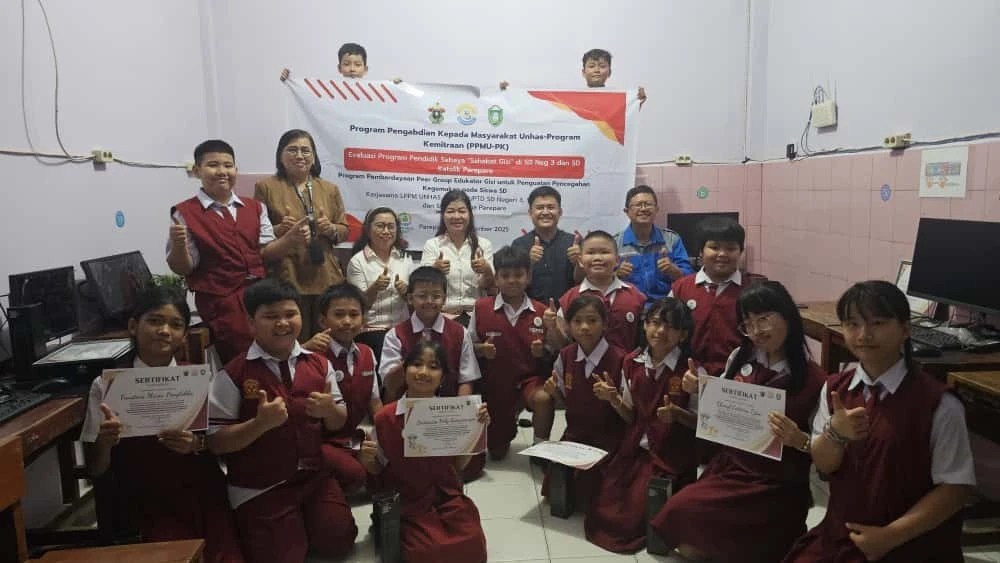 Kunjungan Tim PPMU Unhas berdiskusi dengan para siswa dan guru pendamping tentang proses pelaksanaan program Sahabat Gizi.